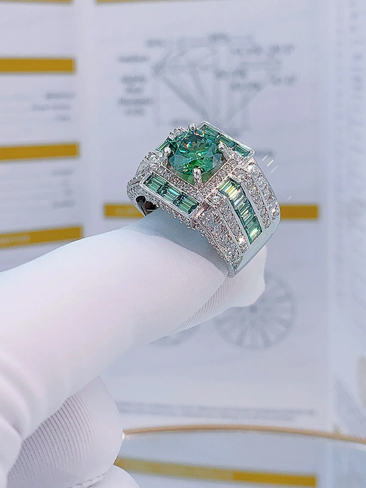 Nhẫn bạc nam full moissanite xanh, viên chủ 8 ly, thân nhẫn xếp đá baguette xanh và nhiều hàng đá trắng, mã RM0207
